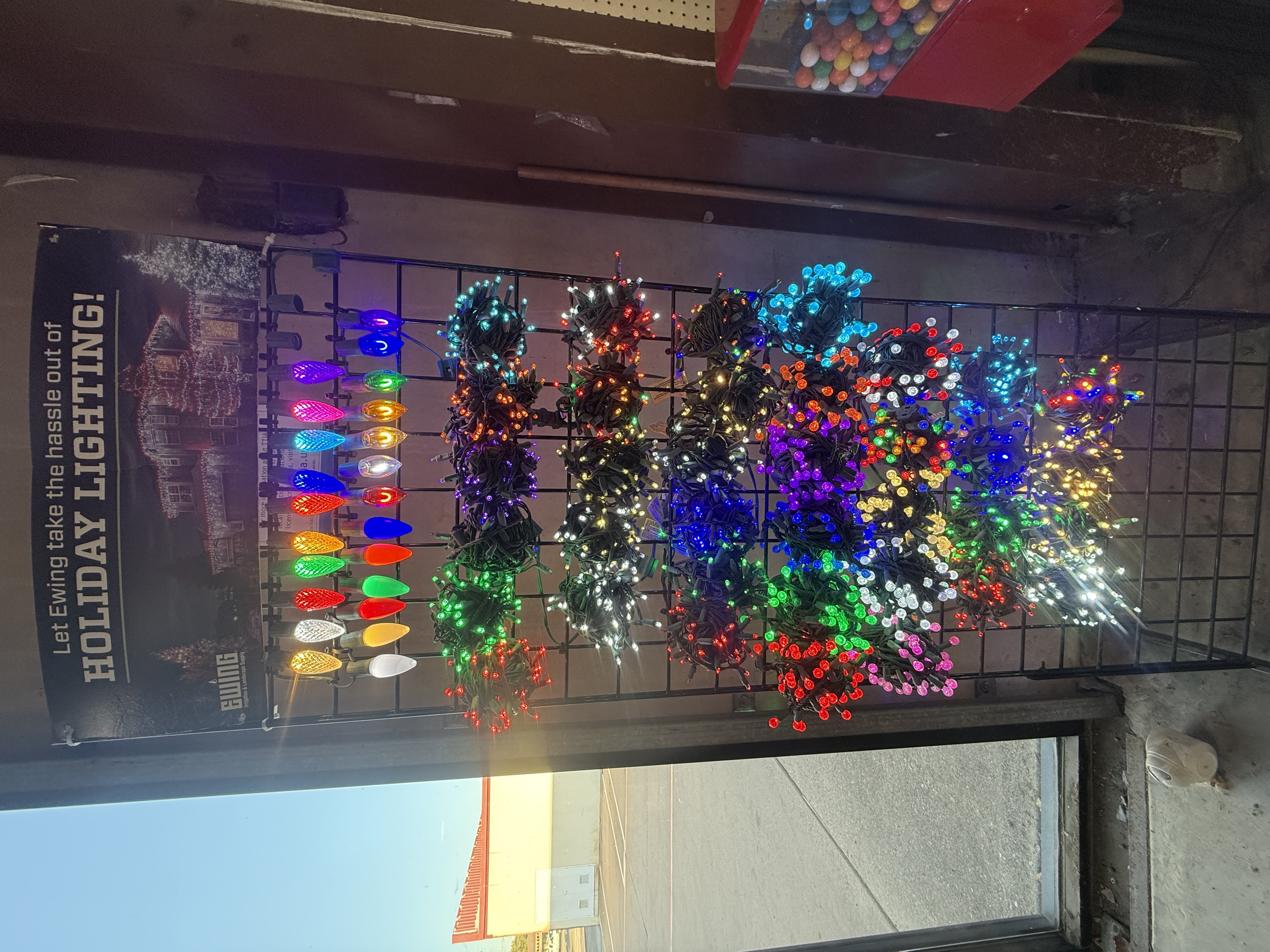 Display showing variety of holiday light color options and styles available